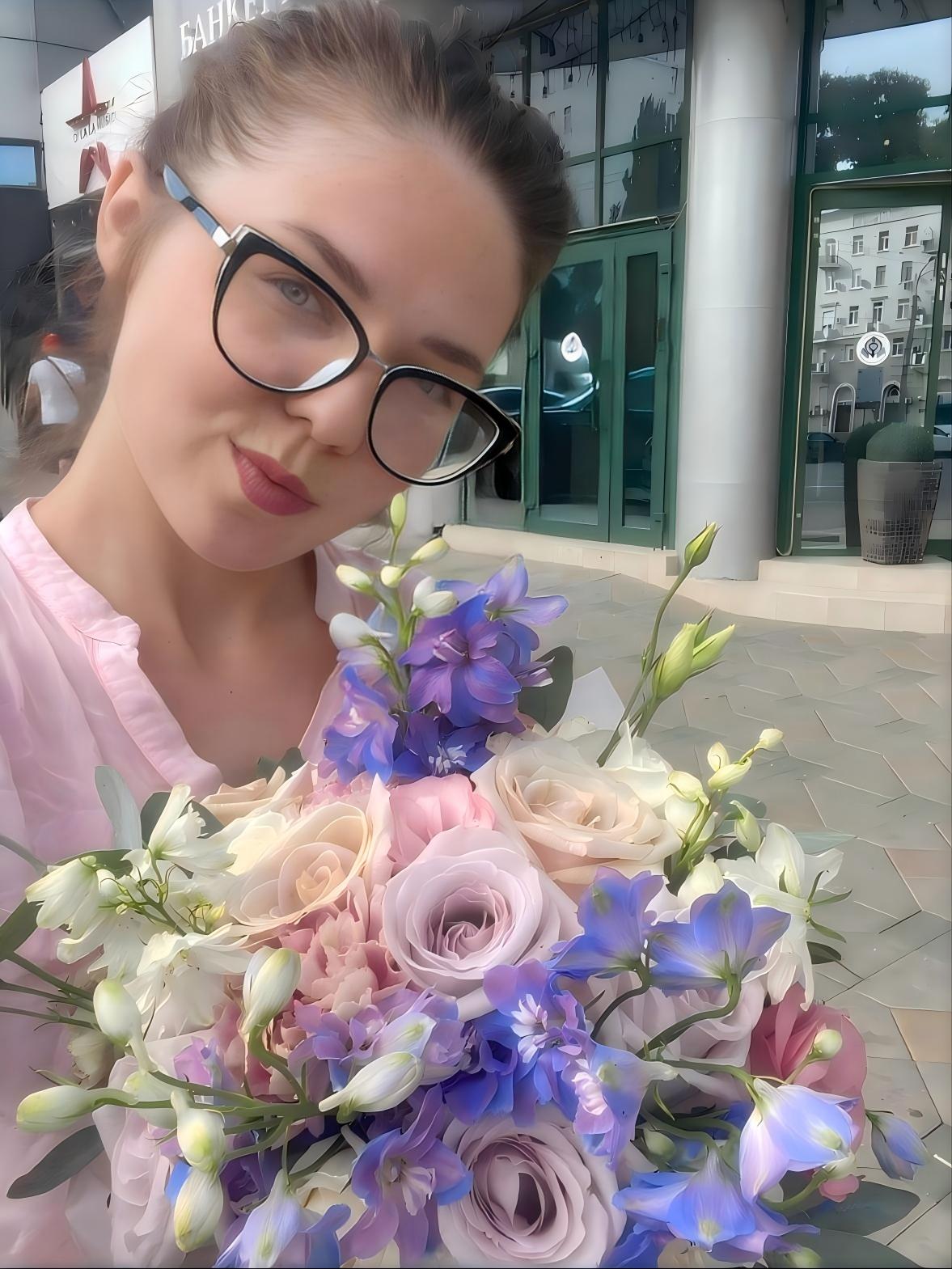Florist holding bouquet